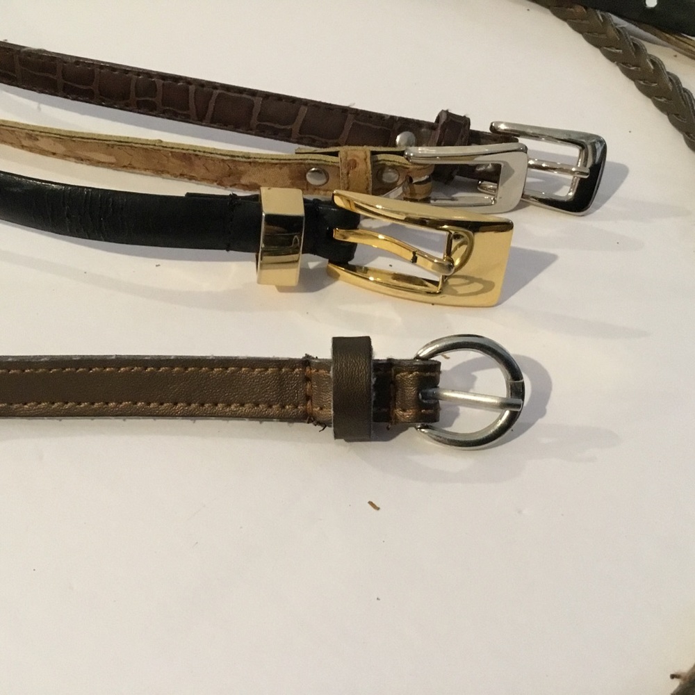 Belts”. 1 black in leather .3 others faux leather. Lot of 4
